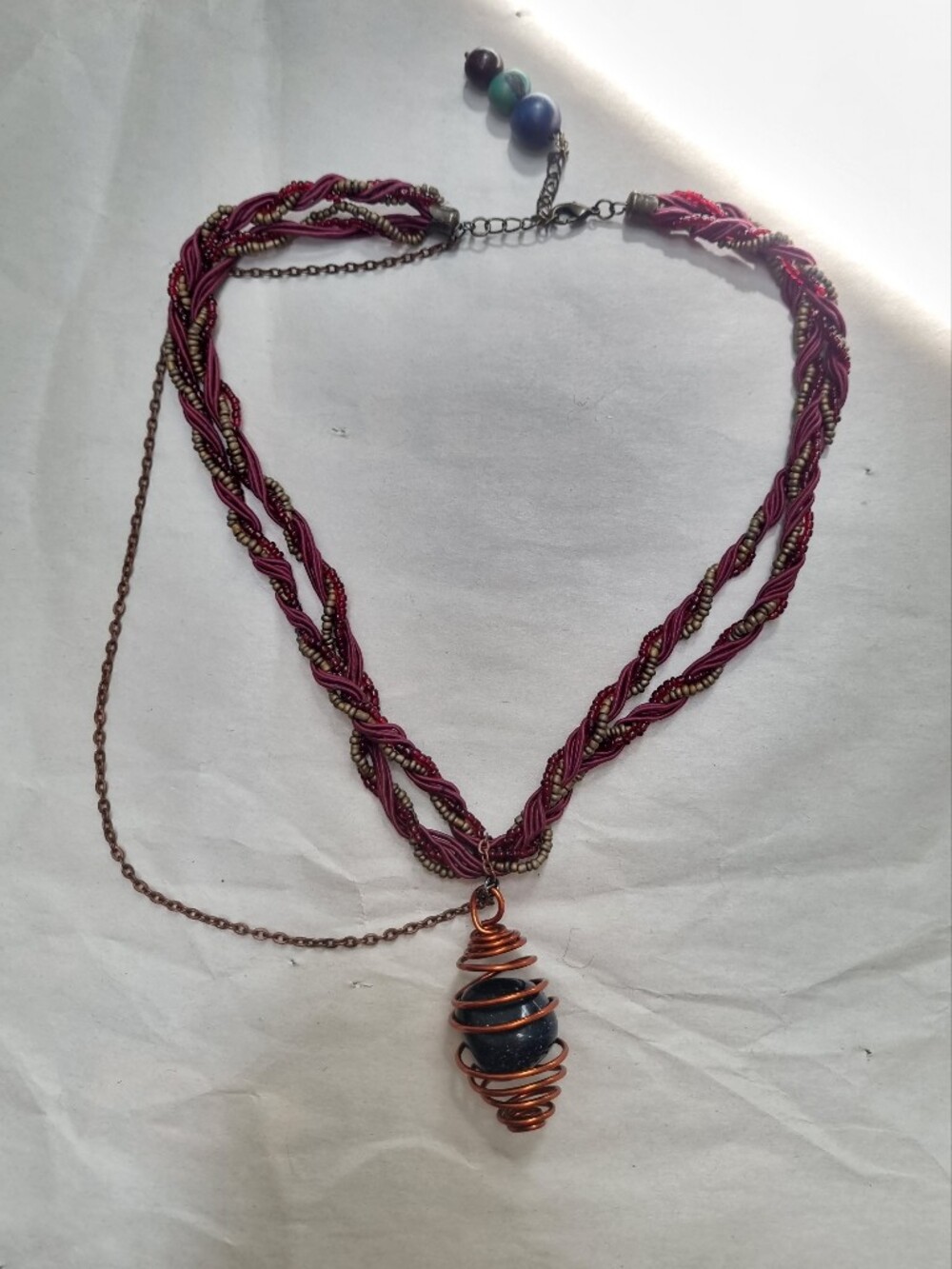 SLS Creation | Steampunk Copper Wrapped Blue Sunstone Pendant On Marroon Cord - Picture 2 of 2